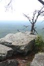 Rock formation overlooking valley.