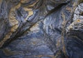 Rock formation in shades of blue and orange.