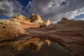 Rock formation and reflection at sunset, White Pocket, Vermillion Cliffs