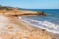 Rock formations on the beach in Alcossebre, Spain