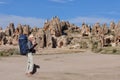 Rock formations of Cappadocia and photographer Royalty Free Stock Photo