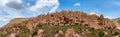 Rock formations and cave town in Zelve Valley, Cappadocia, Turkey Royalty Free Stock Photo