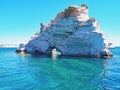 Rock formations off the coast of Polyaigos, an island of the Greek Cyclades Royalty Free Stock Photo