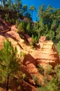 Rock formations and woods on Le Sentier des Ocres in Roussillon