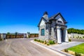 Rock Gate House & Wooden Gate Entrance Royalty Free Stock Photo