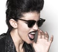 Rock girl wearing sunglasses half profile