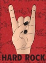 Hard rock hand gesture, horn, isolated on red background with scratched texture, grunge. Royalty Free Stock Photo