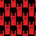 Rock hand sign red seamless pattern. Background of symbol of ro Royalty Free Stock Photo