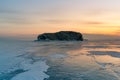 Rock on iced water lake Baikal Russia winter season Royalty Free Stock Photo