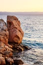 Rock island at golden sunset in Brela Royalty Free Stock Photo