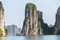 Rock islands near floating village in Halong Bay, Vietnam.