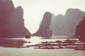 Rock islands near floating village in Halong Bay, Vietnam, Southeast Asia Royalty Free Stock Photo