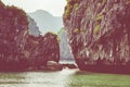 Rock islands near floating village in Halong Bay, Vietnam, Southeast Asia Royalty Free Stock Photo