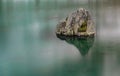 A rock in the lake of Julierpass in Switzerland Royalty Free Stock Photo