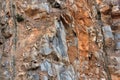 Rock layers - a colorful formations of rocks stacked over the hundreds of years. Interesting background with fascinating texture Royalty Free Stock Photo