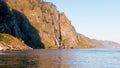 Rock mass, nesting place for large cormorants and silver gulls, cliff `Birds market`. Royalty Free Stock Photo