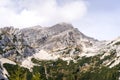 Rock mountain and green autumn fall forest in Julian Alps Julijske Alpe Alpi Giulie Alps, Slovenia Slovenija Royalty Free Stock Photo