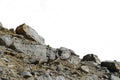 Rock mountain slope or top foreground close-up isolated on white background. Element for matte painting, copy space.