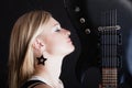 Rock music. Girl musician guitarist with electric Royalty Free Stock Photo