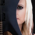 Rock music. Girl musician guitarist with electric guitar Royalty Free Stock Photo