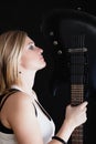 Rock music. Girl musician guitarist with electric guitar Royalty Free Stock Photo