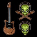 Rock music set of vector objects, alien head in headphones and guitar. Colorful cartoon illustrations on dark background Royalty Free Stock Photo