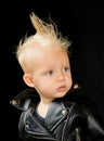 Rock music is always superior. Adorable small music fan. Little rock star. Little child boy in rocker jacket. Rock style Royalty Free Stock Photo