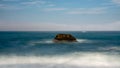 A rock in the ocean at Bodega Bay Royalty Free Stock Photo