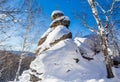 A rock with an Orthodox cross. Mountain Church. Resort Belokurikha, Altai, Russia