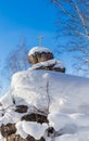 A rock with an Orthodox cross. Mountain Church. Resort Belokurikha