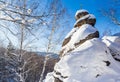 A rock with an Orthodox cross. Mountain Church. Resort Belokurikha