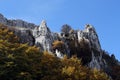 Rock outcroppings in autumn, with the moon Royalty Free Stock Photo