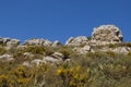 View from hiking trail of rock outcrops on the ridge of the Cavall Verd, Alicante Province, Spain Royalty Free Stock Photo