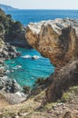 Rock over chasm and beautiful natural lagoon down, Turkey