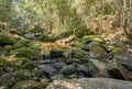 Rock over the waterway. Beauty in the nature. Tropical rainforest in Thailand. Waterfall in summer season. Royalty Free Stock Photo