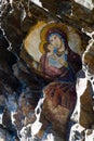 Rock painting of virgin mary and jesus