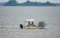 Rock Point, Maryland, U.S - August 15, 2020 - A boat picking up the crab pots on Potomac River