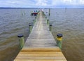Rock Point, Maryland, U.S - August 13, 2020 - A wooden deck by the bay