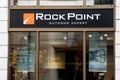 Rock Point Outdoor Experts logo in front of their local store in downtown Prague.