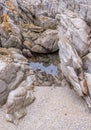 A rock pond in an isolated spot Royalty Free Stock Photo