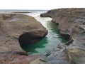 Rock pool by the ocean Royalty Free Stock Photo