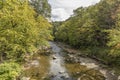 Rock river in Williamsville, Vermont with green trees, New England