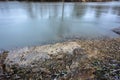 Rock on A Riverbank During Winter