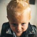 Rock and roll fashion trend. Little rock star. Little child boy in rocker jacket. Rock style child. Adorable small music Royalty Free Stock Photo