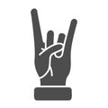 Rock and roll gesture solid icon, Hand gestures concept, Heavy metal sign on white background, sign of the horns icon in