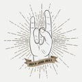 Rock and roll music hand. Typography graphic for clothes with sunray and ribbon. Print for t-shirts, poster, apparel. Vector. Royalty Free Stock Photo