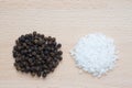 Rock salt and black pepper corns Royalty Free Stock Photo