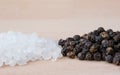 Rock salt and black pepper corns Royalty Free Stock Photo