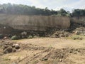 Open rock outcrops in sand and rock quarry during the day