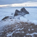 Rock Shaman. Lake Baikal, winter. Cape Burhan landscape. Royalty Free Stock Photo